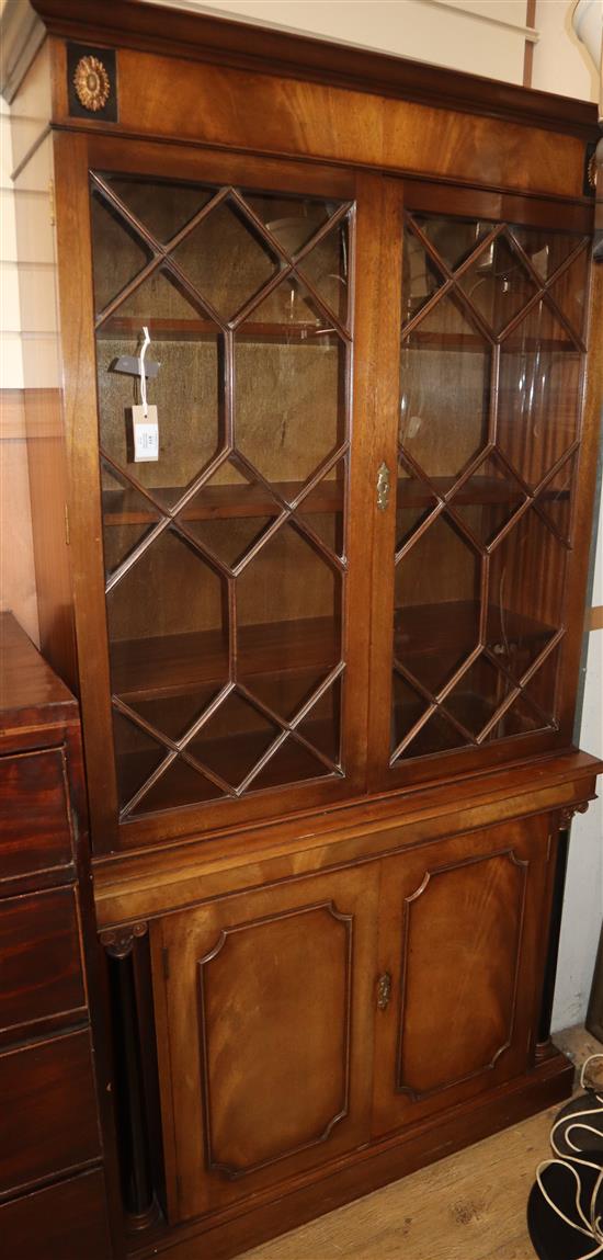 A reproduction mahogany bookcase W.94cm